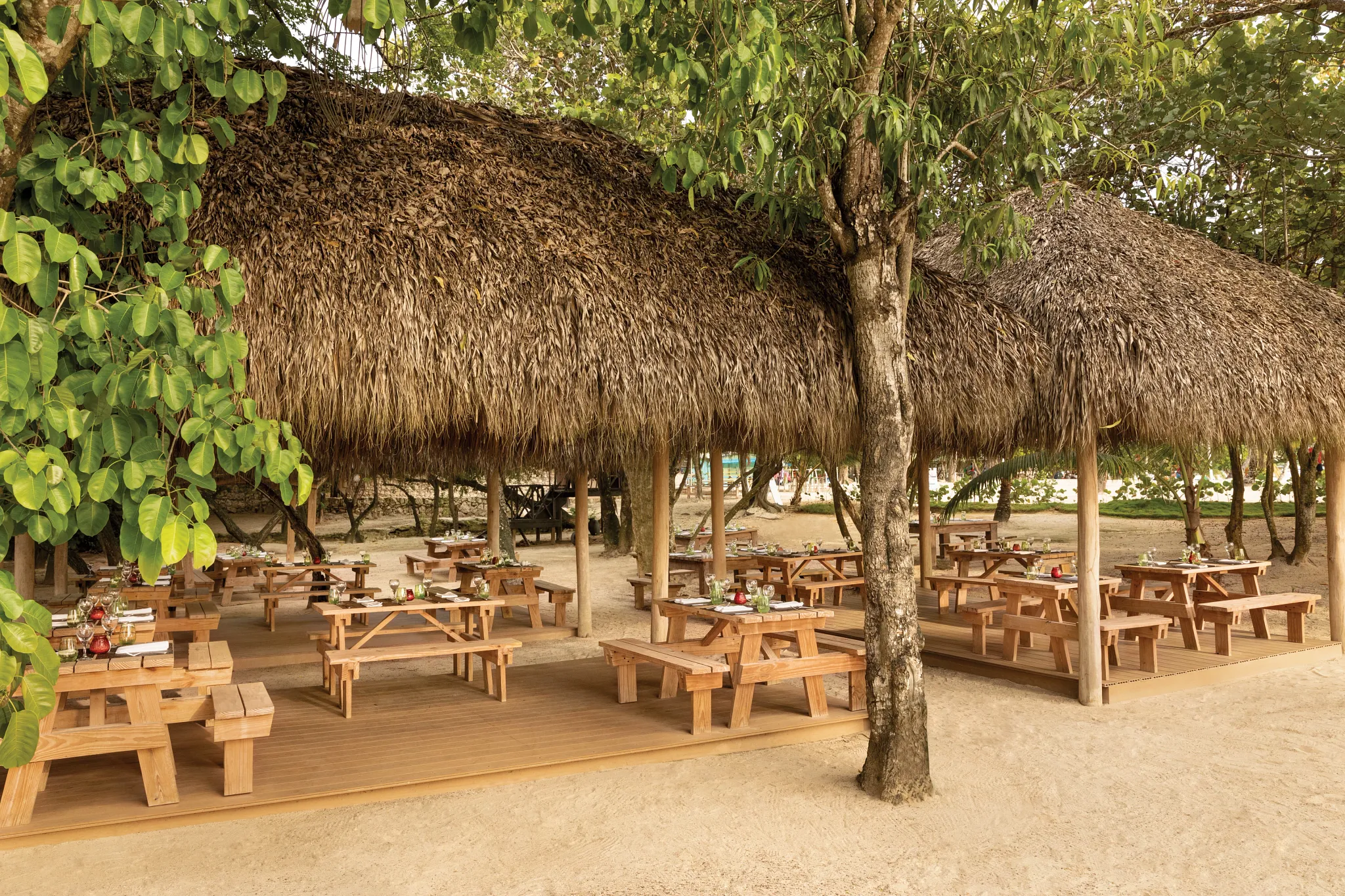 Chinola bar at Secrets La Romana Resort & Spa featuring tropical cocktails, stylish lounge seating, and vibrant Caribbean ambiance.