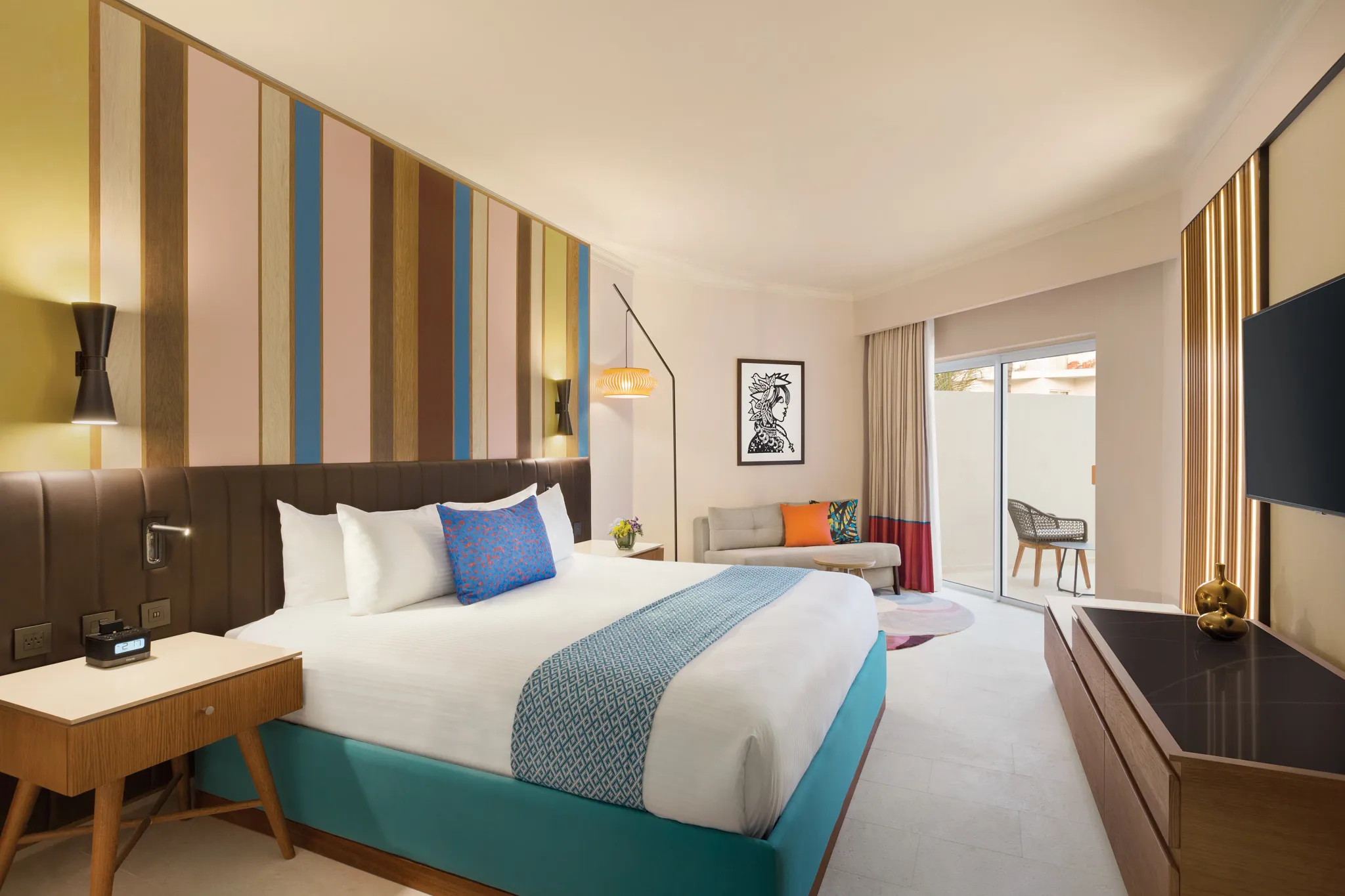 Deluxe Garden View Accessible king room with private terrace at Secrets La Romana Resort & Spa.