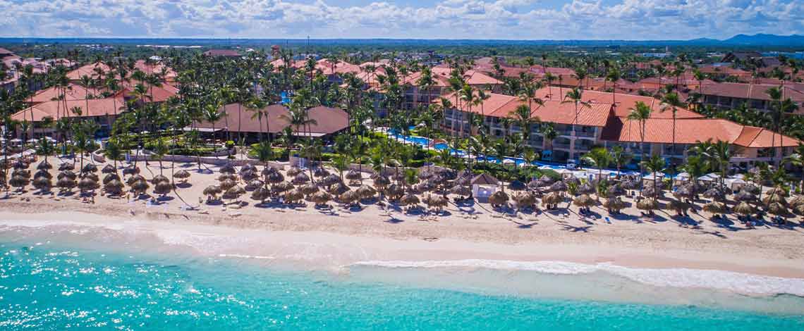 Majestic Elegance Punta Cana luxury all-inclusive resort with beachfront pools, colonial architecture, and family amenities in Dominican Republic.