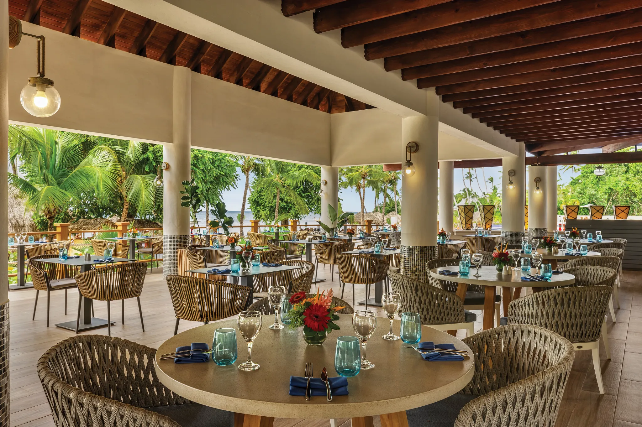 Mare Grill & Restaurant at Secrets La Romana Resort & Spa featuring beachfront dining, grilled specialties, and tropical oceanfront ambiance.