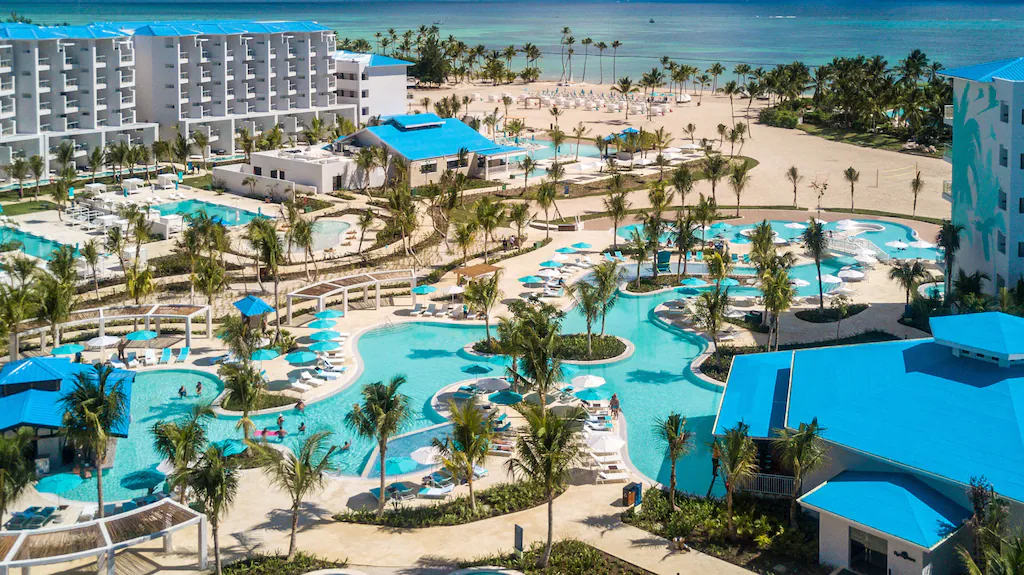 Margaritaville Island Reserve Cap Cana all-inclusive resort with beachfront pools, tropical vibes, and laid-back luxury in Punta Cana.