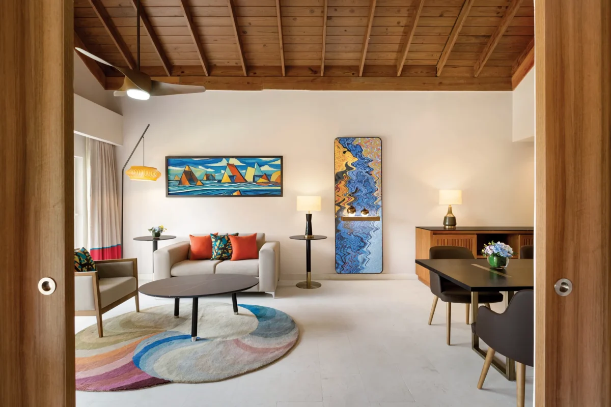 Preferred Club Garden View Suite living room with modern furnishings at Secrets La Romana Resort & Spa.