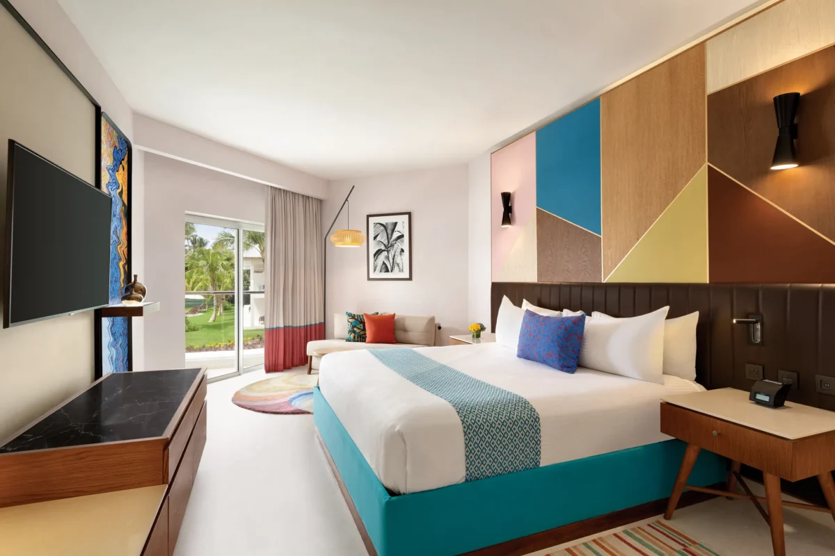 Preferred Club Partial Ocean View king room with furnished balcony at Secrets La Romana Resort & Spa.
