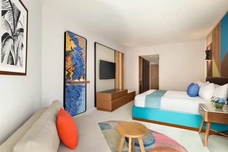 Preferred Club Swim Out Garden View room seating area at Secrets La Romana Resort & Spa.