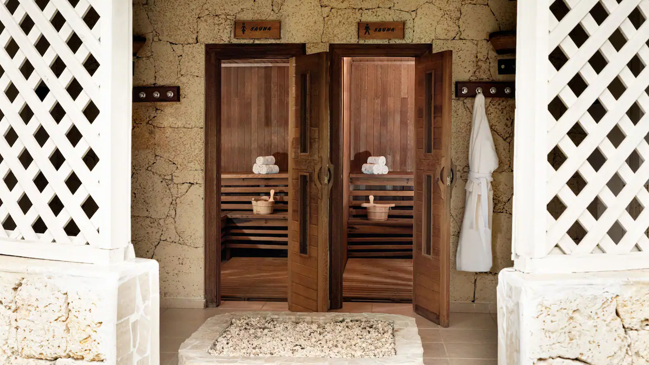 Wooden sauna rooms inside the spa wellness area at Secrets La Romana Resort & Spa.