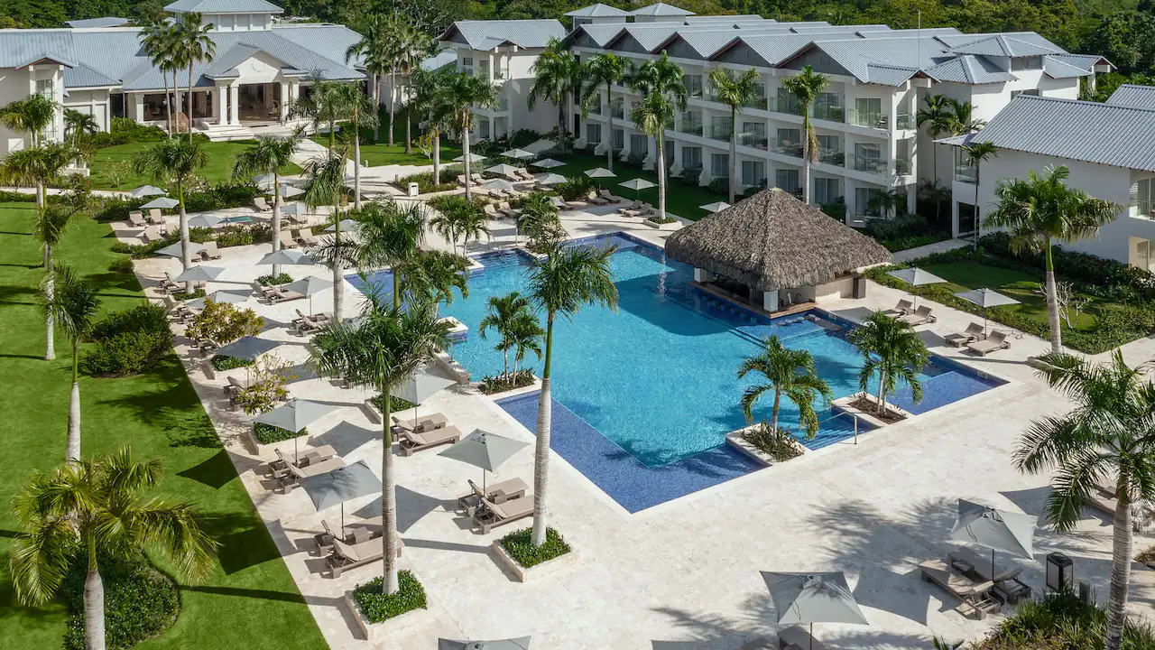 Aerial view of the swim-up bar and resort pool at Secrets La Romana Resort & Spa.